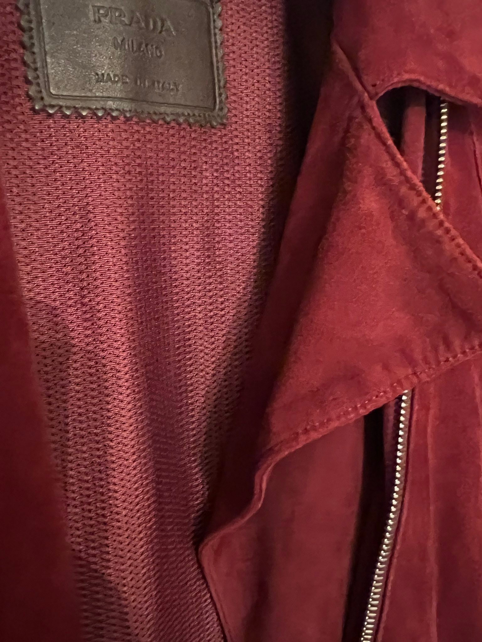 Is the Prada Milano Mint Red Suede Asymmetrical Moto jacket a real 