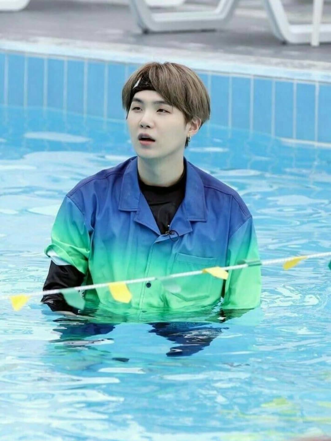BTS Suga in a swimming pool