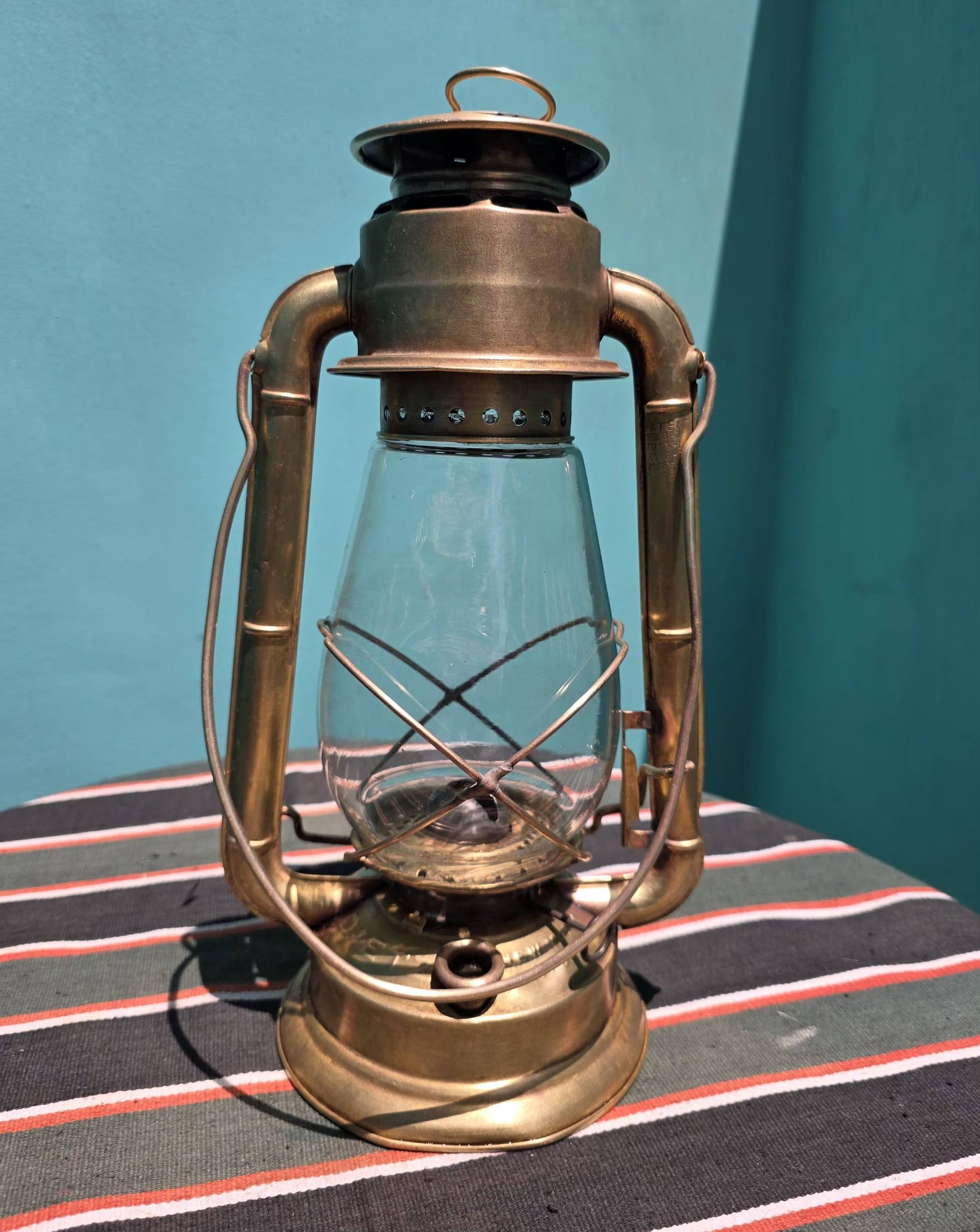 This is an antique or vintage Dietz Junior brass kerosene lamp or 