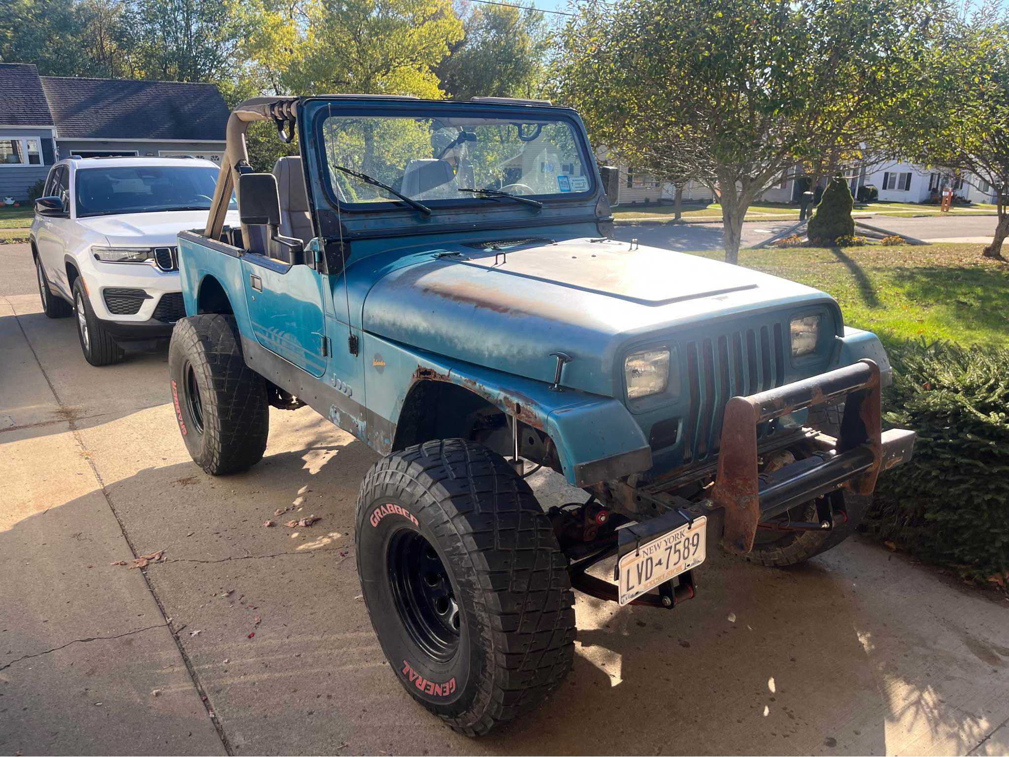 Original window sticker and 1991 Jeep model line-up catalog