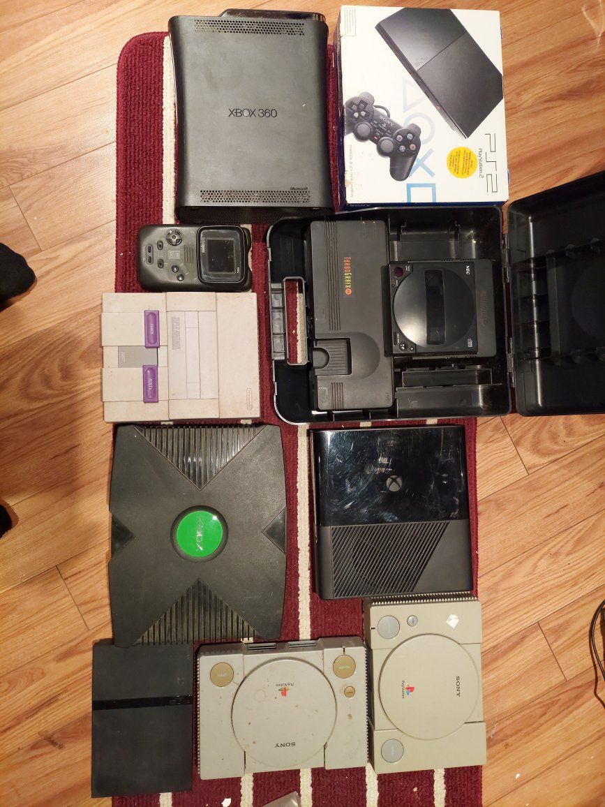 Retro gaming console haul including Xbox 360 and Nintendo 64