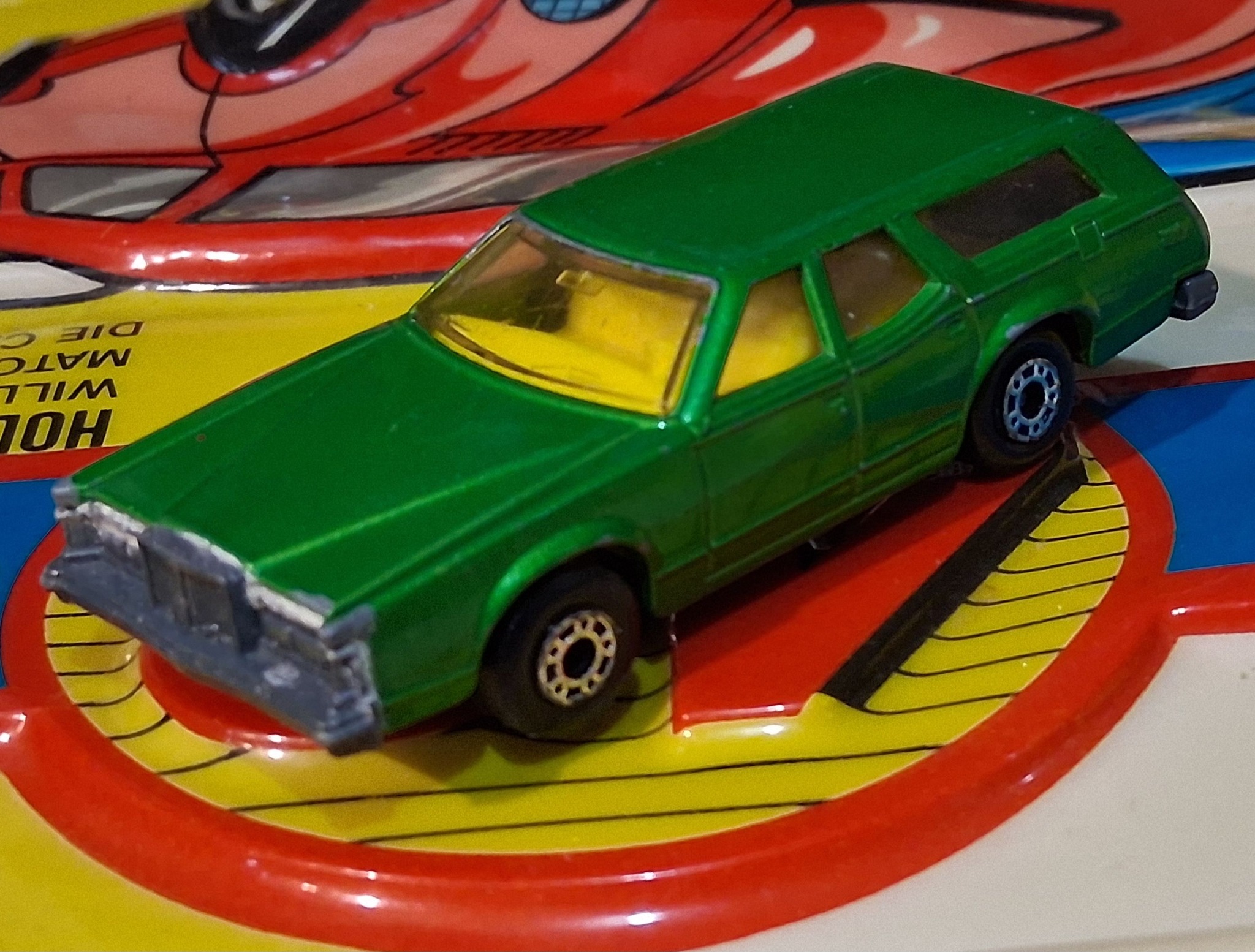 Matchbox no. 74 Cougar Villager models in blue and green