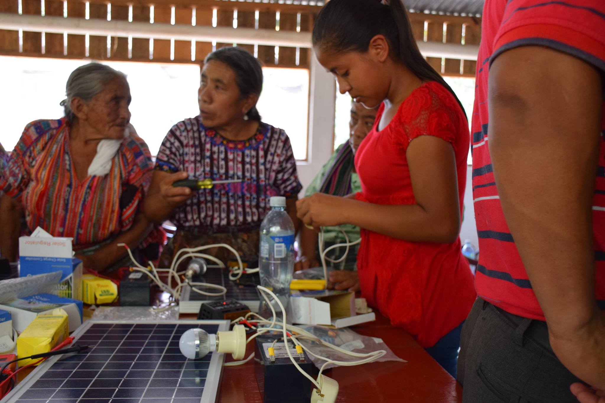 Photos from a community introduction to solar class, installation of ...