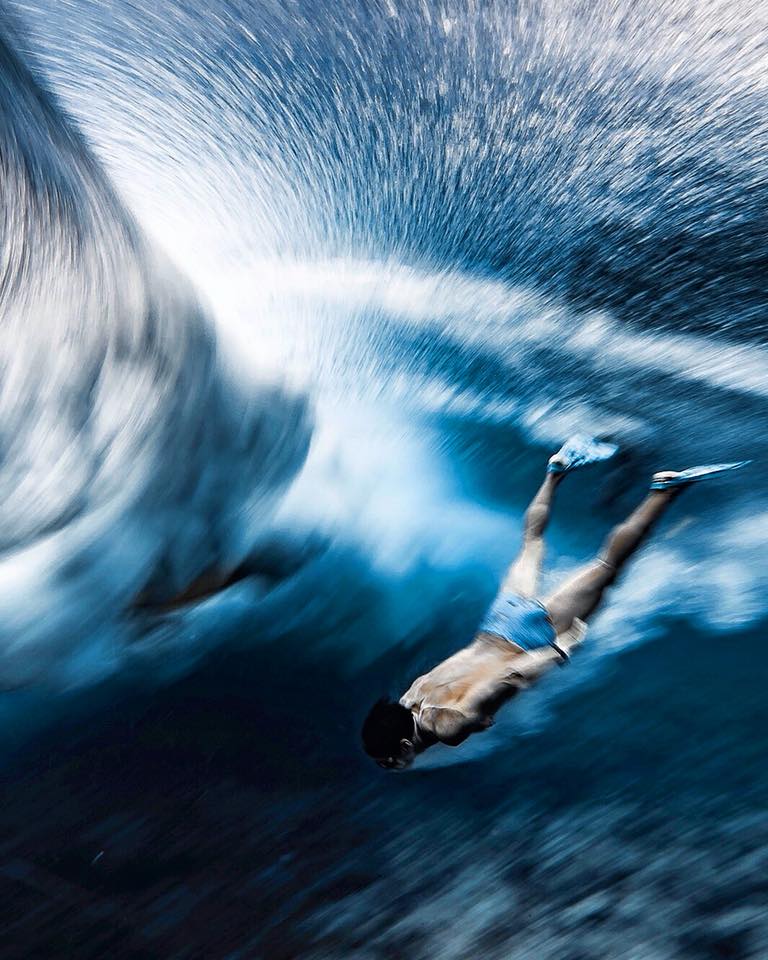 Patrice Chanzy practicing his dolphin surf behind the back of the