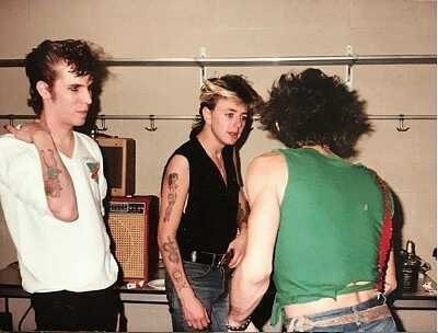 1981: Keith Richards shares a backstage moment with Slim Jim