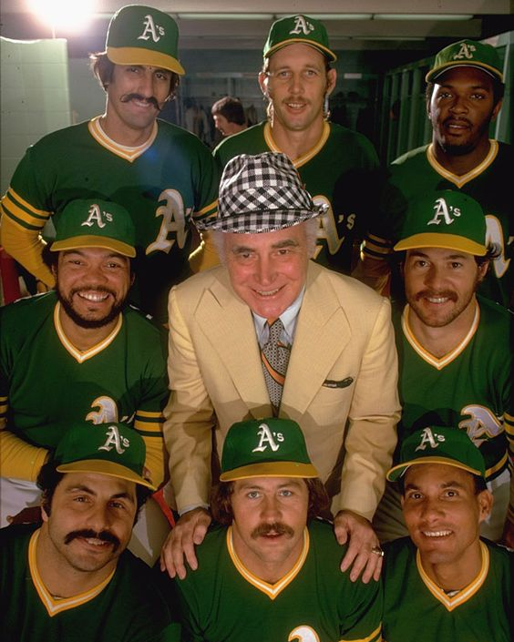Baseball - Charles O. Finley poses withRollieFingers,Joe Rudi, Vida ...