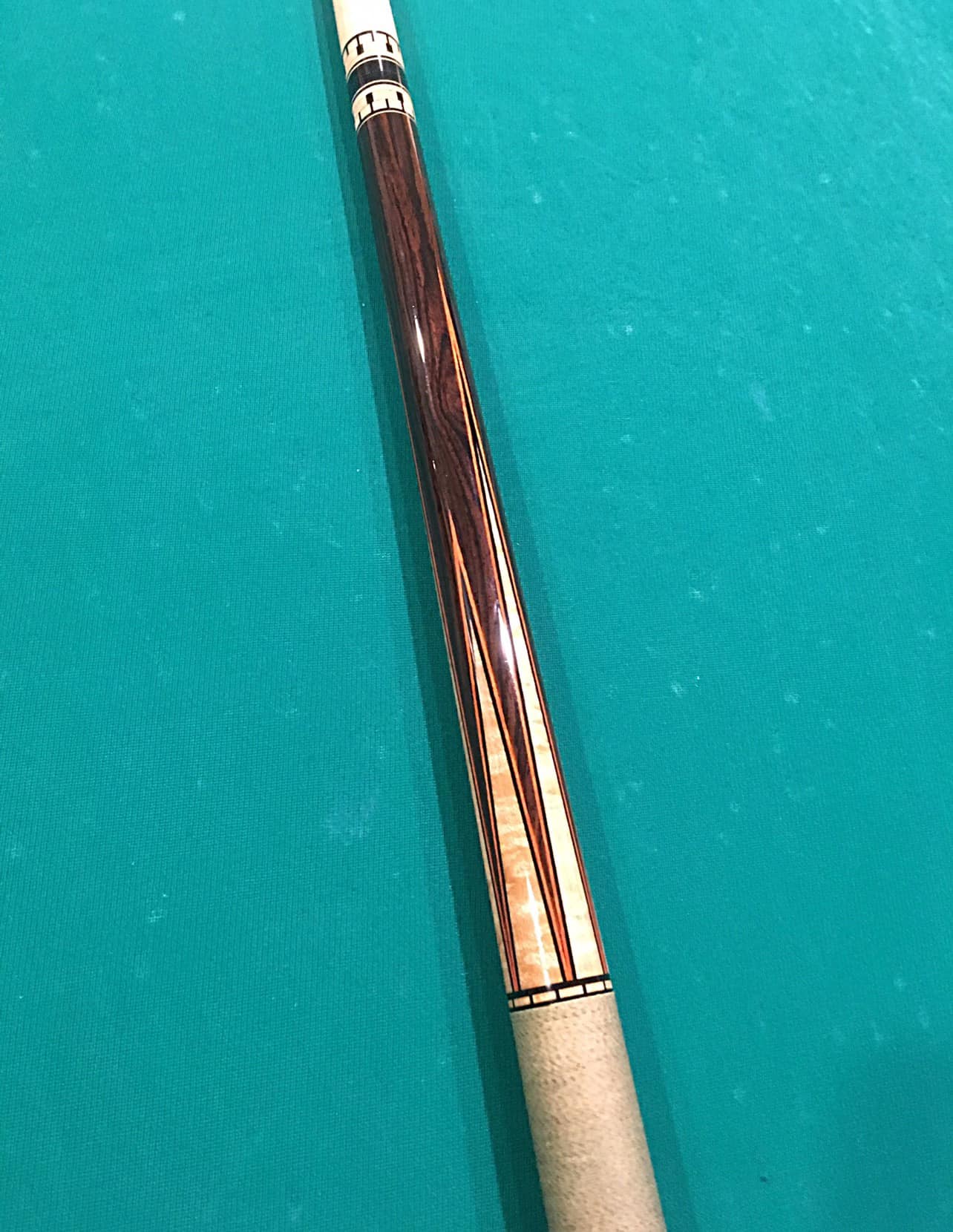 Rare early Omega DPK cue