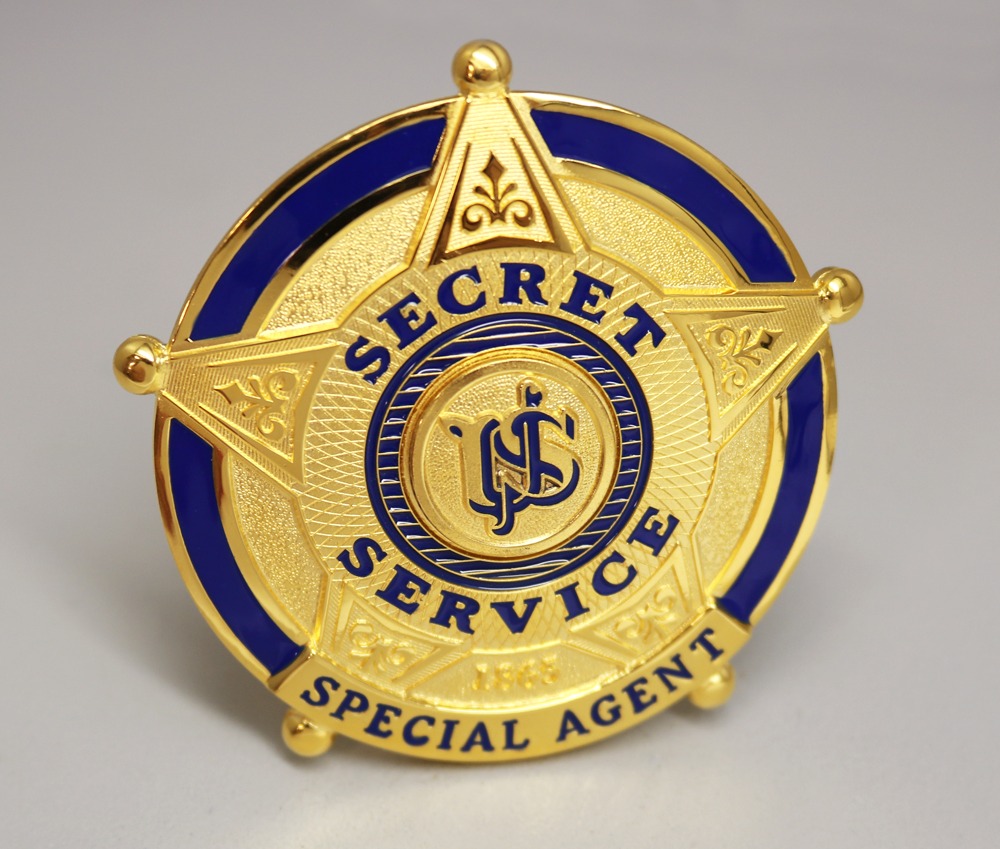 The new badge features intaglio engravings, honoring the Secret