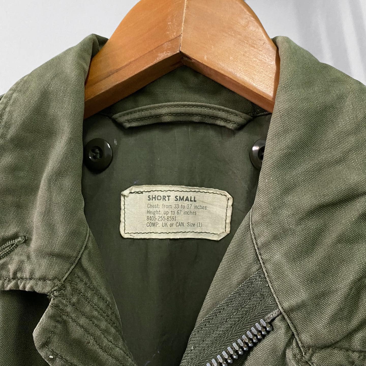 Adding vintage patches to a remake M65 jacket