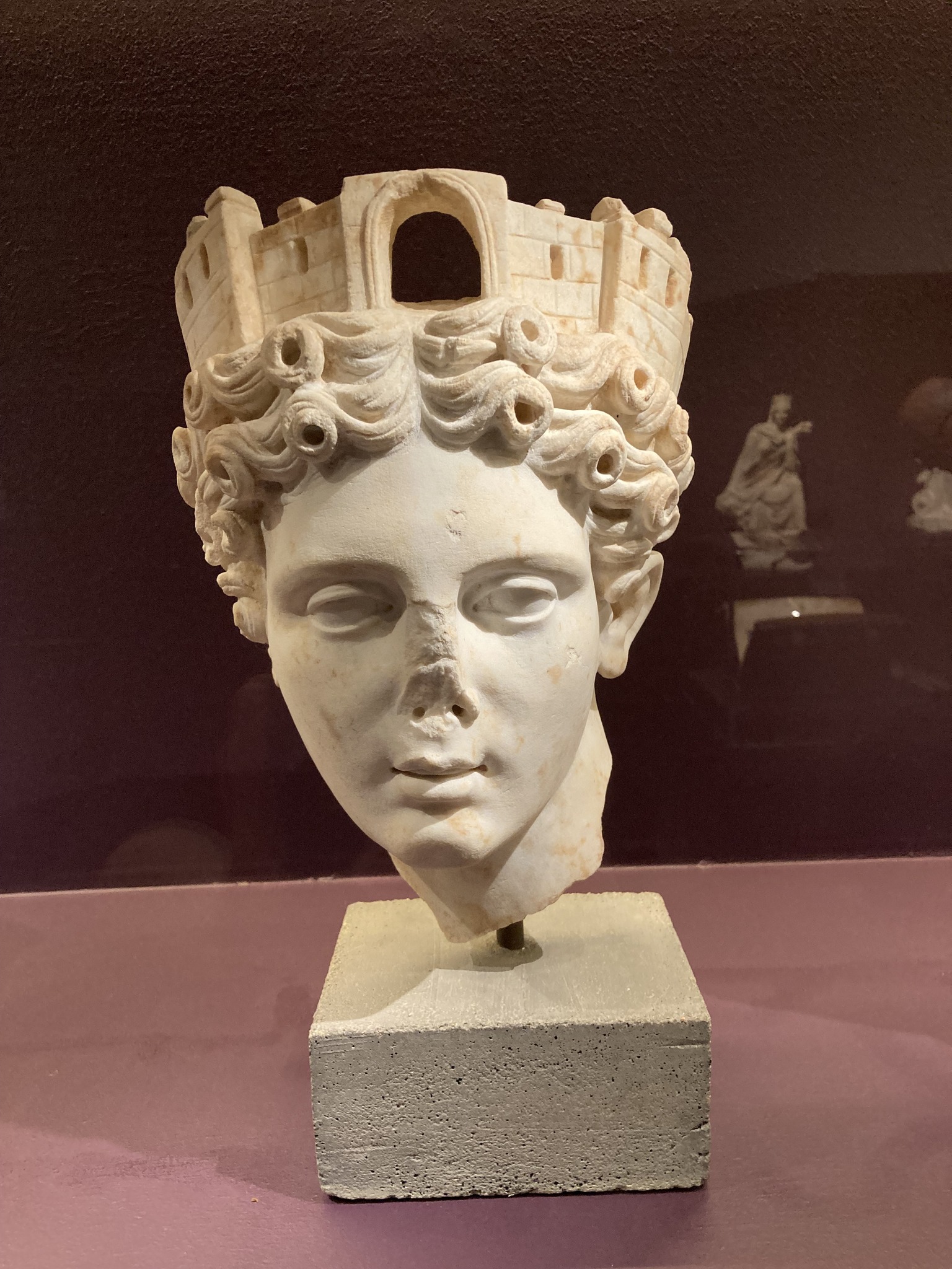 Faces of the Goddess: the mural crown of Tyche/Kybele. One of the