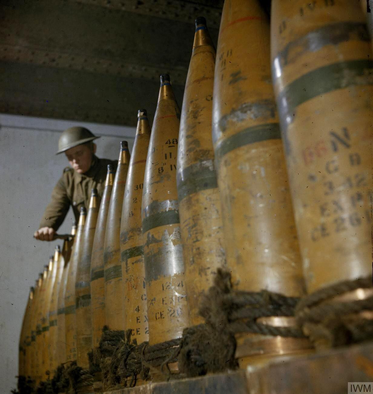 World - Gunner sets nose fuses on 8-inch shells at 428 Battery, Coast ...