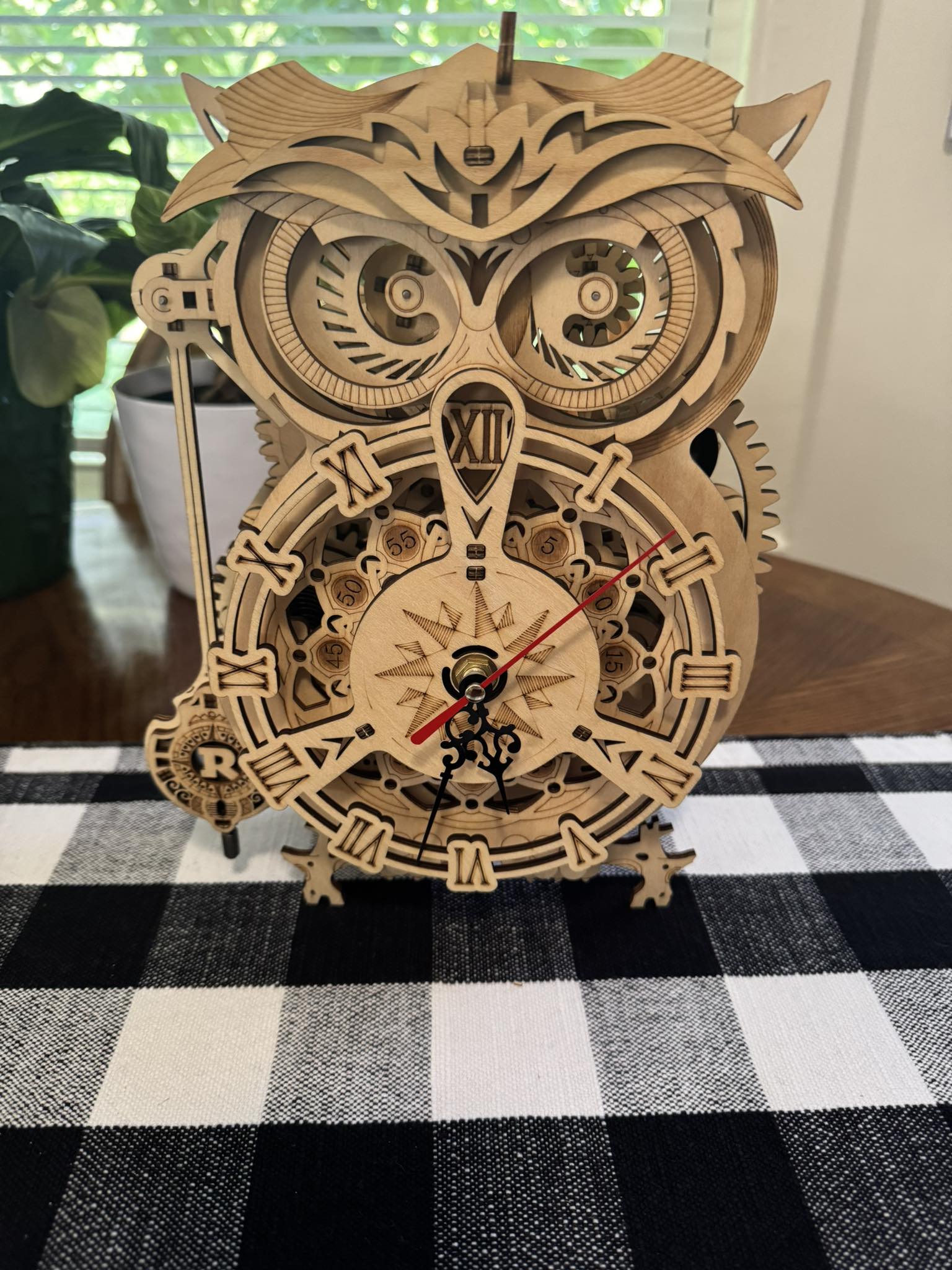 Ugly owl clock made from a loaf pan