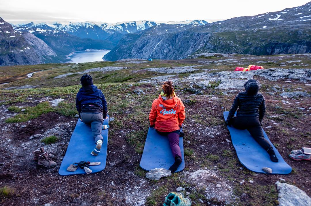 Stretching Out With A Beautiful View Trolltunga Active Facebook