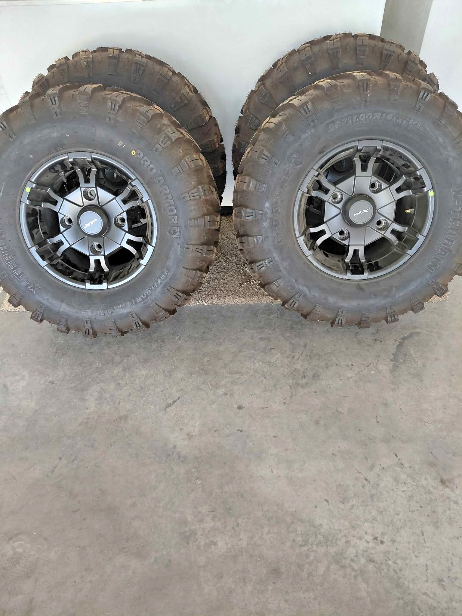 Pro Armor 2 29/1100-14 and 2 29/900-14 tires w/mag rims for Polaris ...