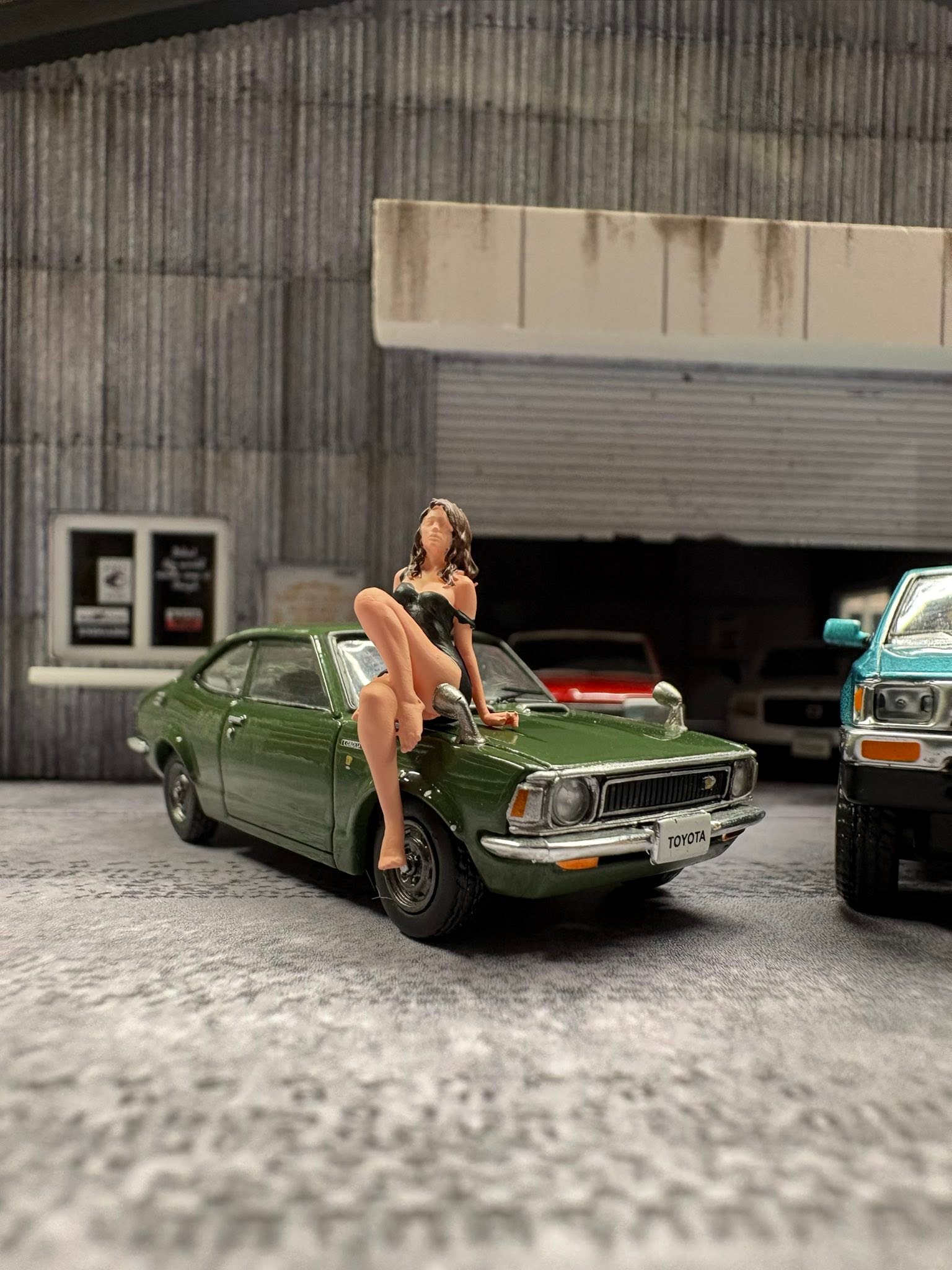 Diecast Toyota models including Corolla and Hilux
