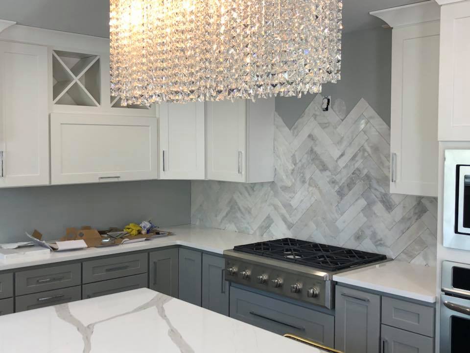 chevron marble tile backsplash