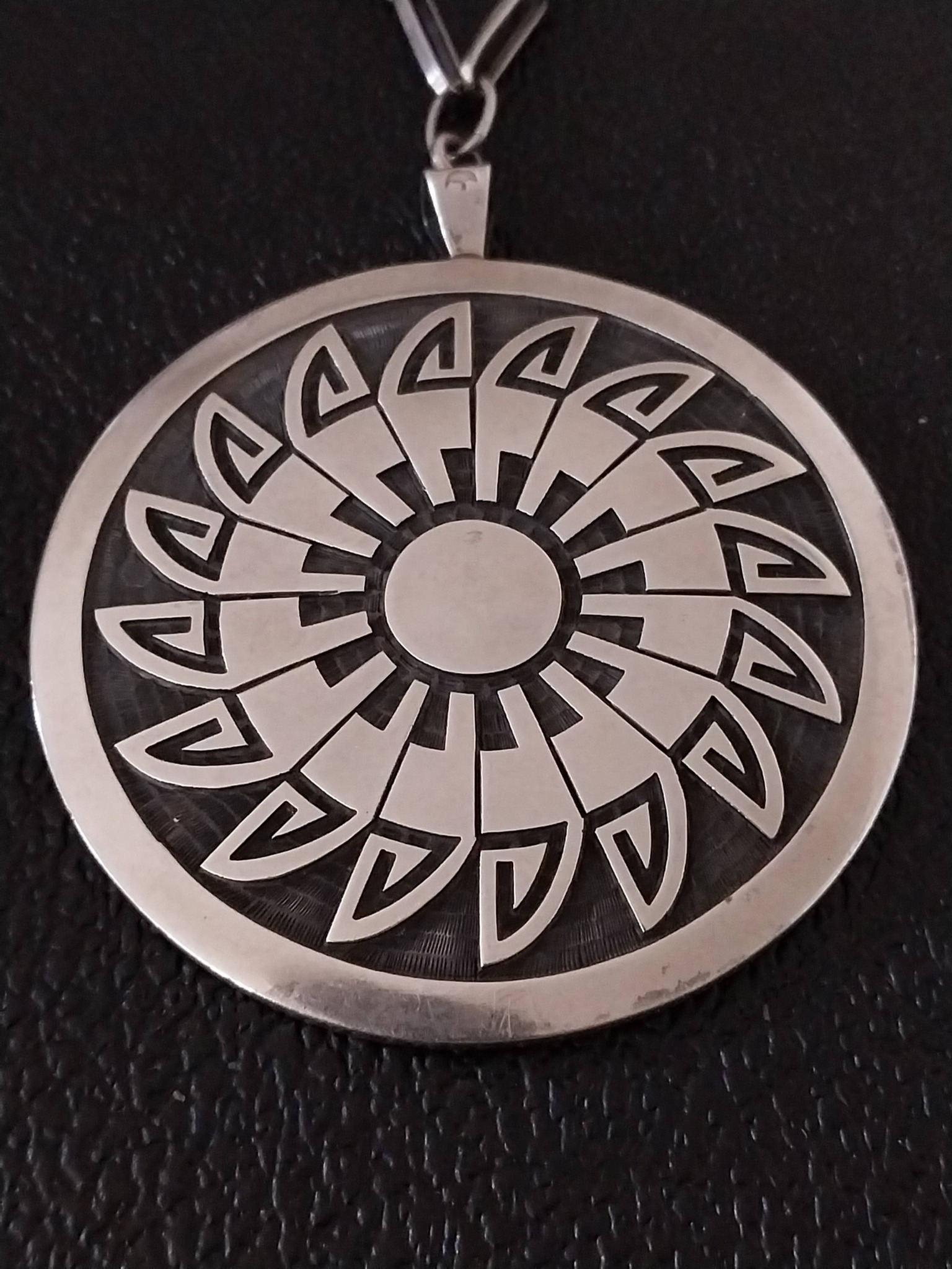 Hopi overlay pendant by Lawrence Saufkie