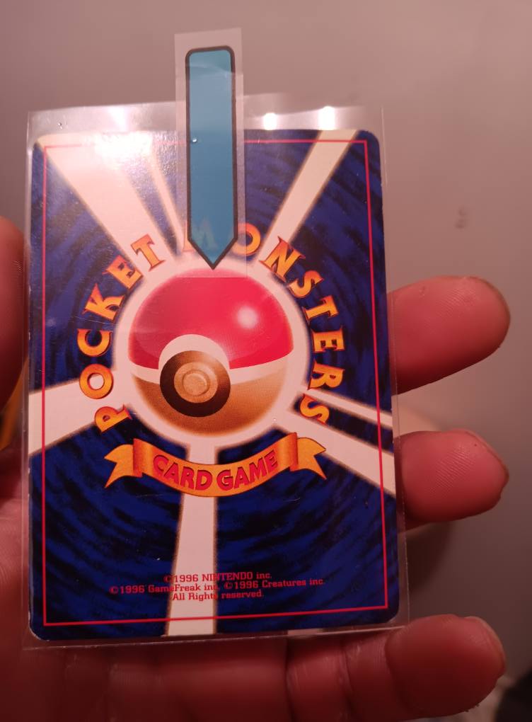 What is the value and authenticity of this Japanese Charizard card?