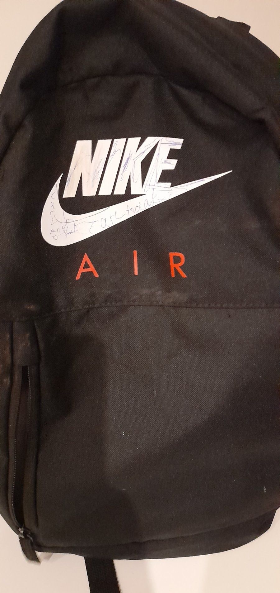 black nike backpack red swoosh Lions L This Nike Heritage backpack will be perfect to transport your belongings to work or school Nike 3 Brand Graphic Print
