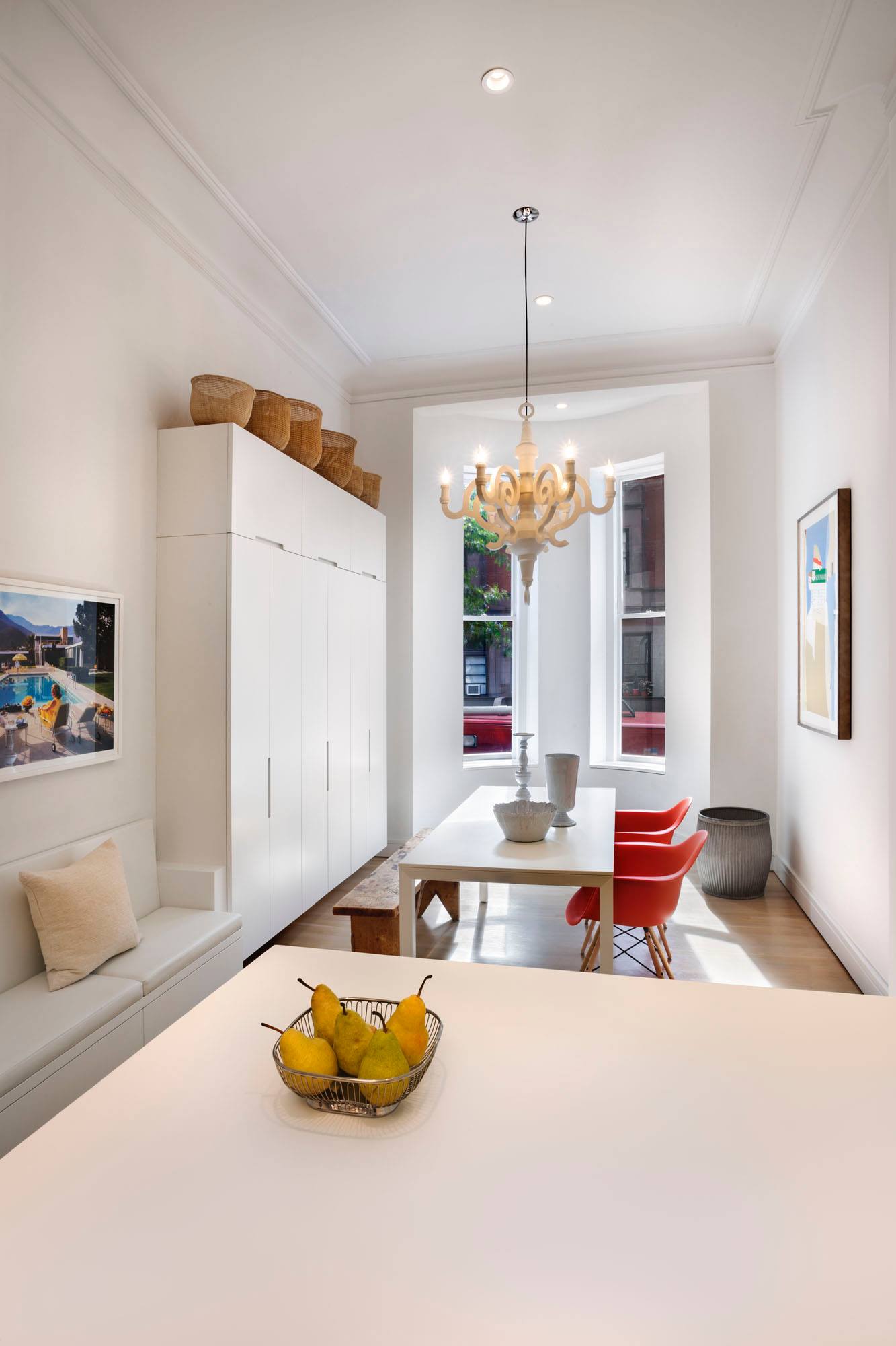 A chic modern kitchen space with... - Chairish By Design