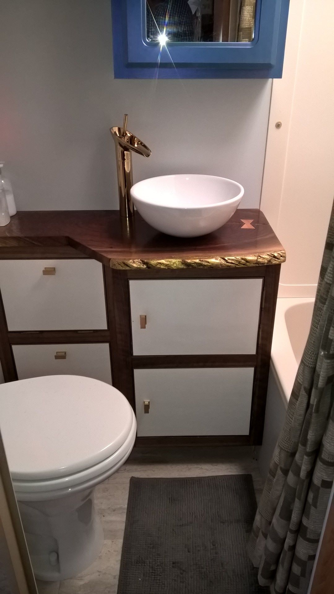 A custom vanity in a travel... - The Jelsafi Corporation