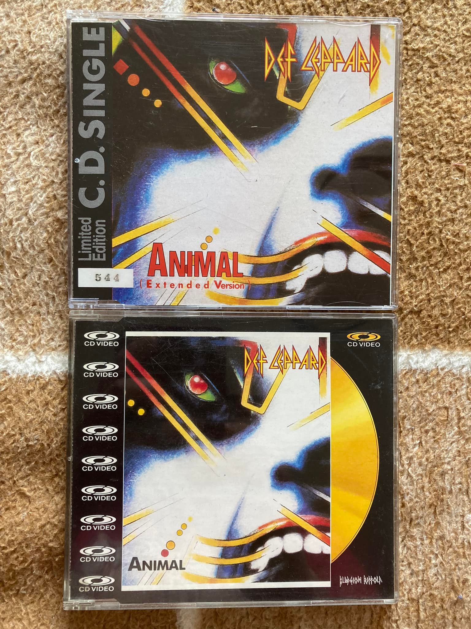 From the collection: Early promo-only SLANG CD, kindly signed by