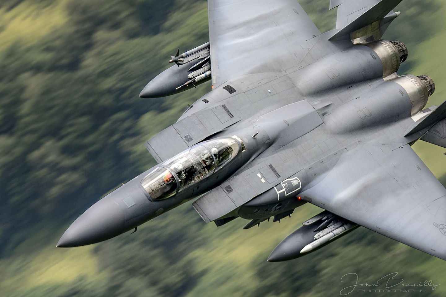 A US F-15 E Pilot photographed with a can of Zyns and a tri-fold