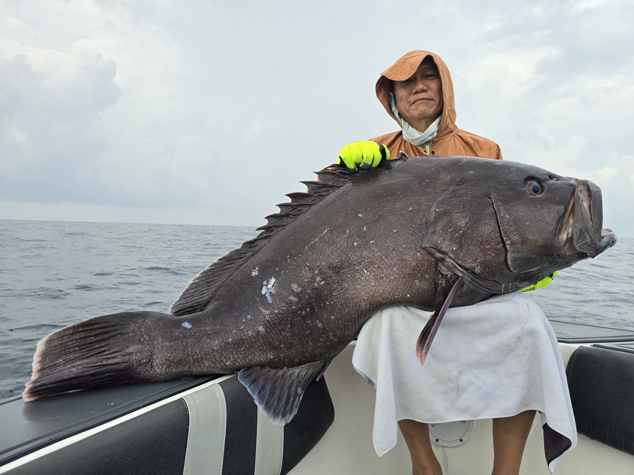 Anwar - In the middle of a rainstorm… at 66 years of age… holding a ...