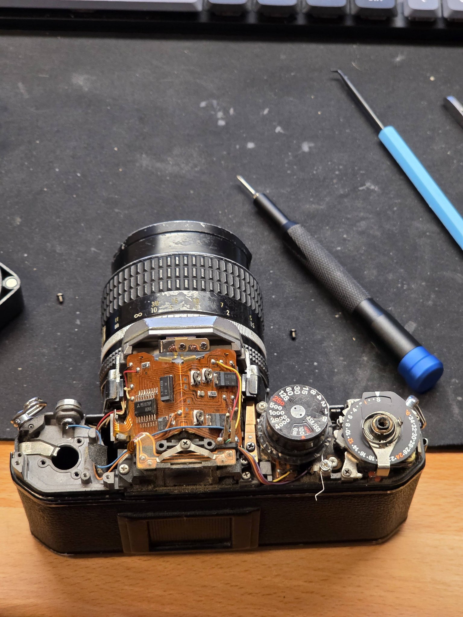 Nikon FM2 camera with broken plastic parts and flex PCB