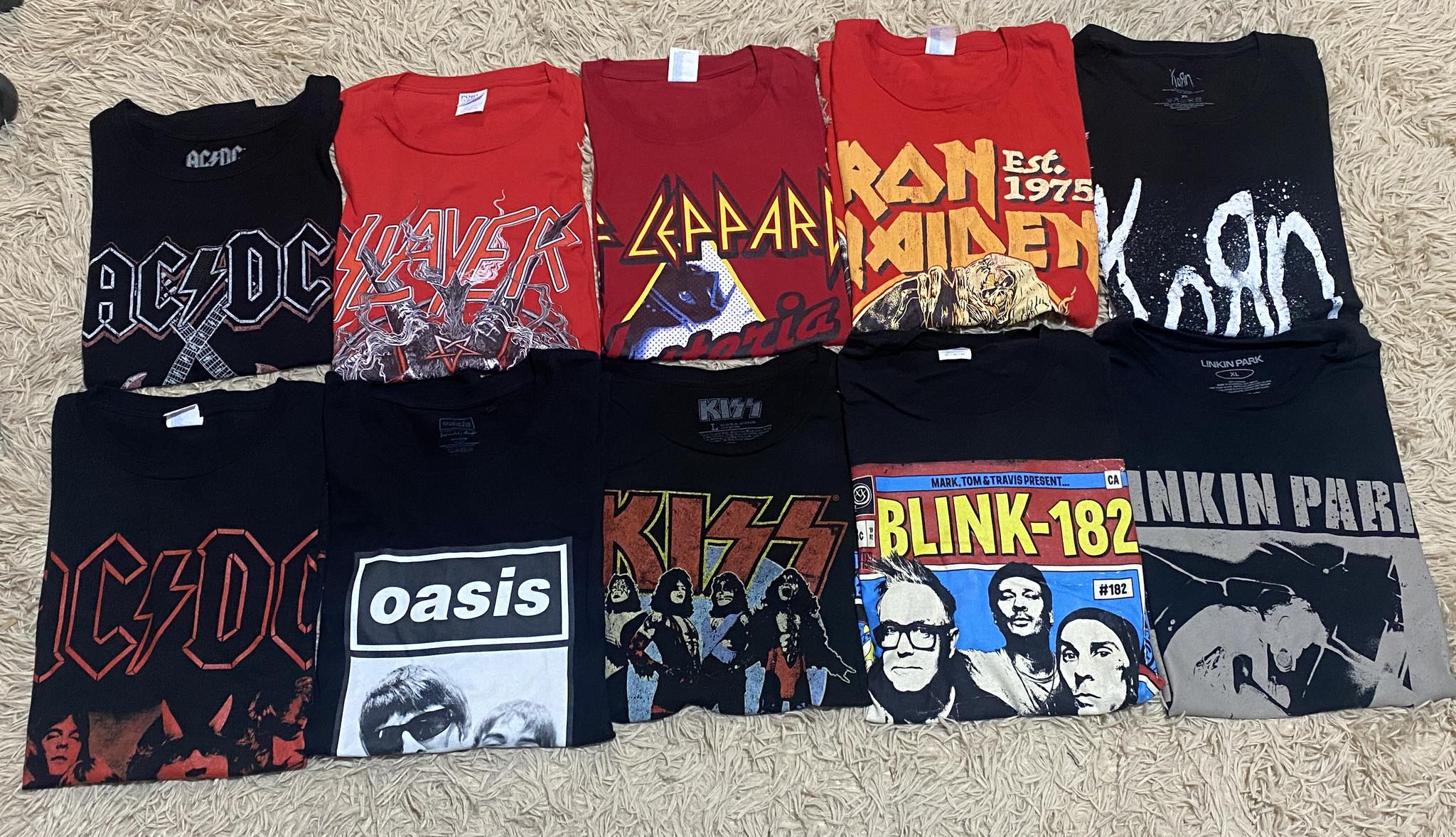 Band shirts for sale from Oasis, ACDC, and more