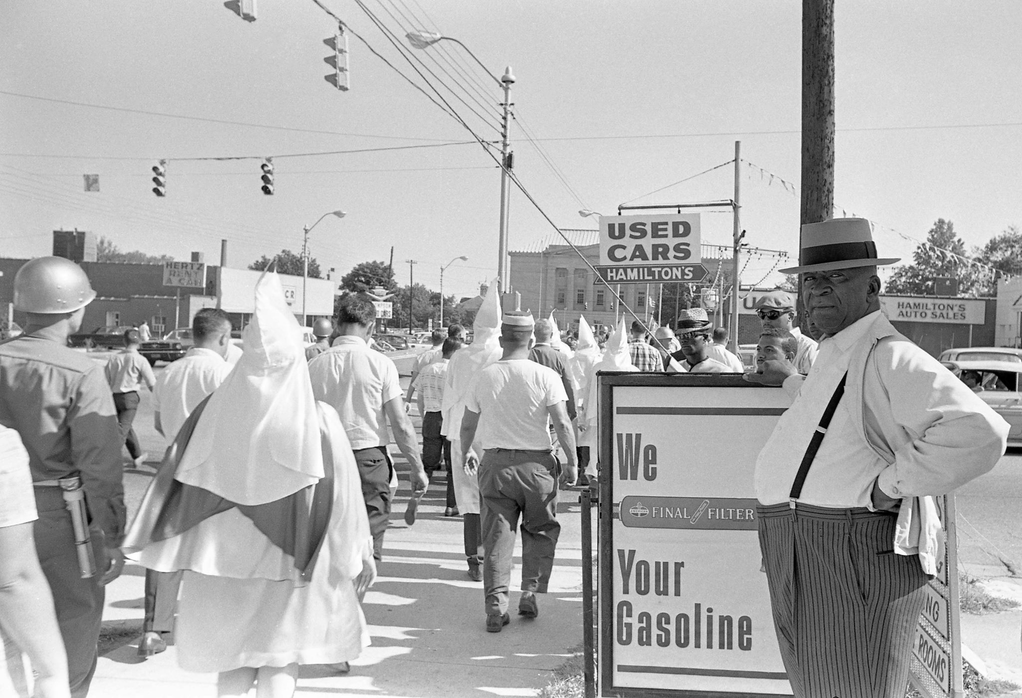 Olde - Man watches as Ku Klux Klan rally marches down Fayetteville ...