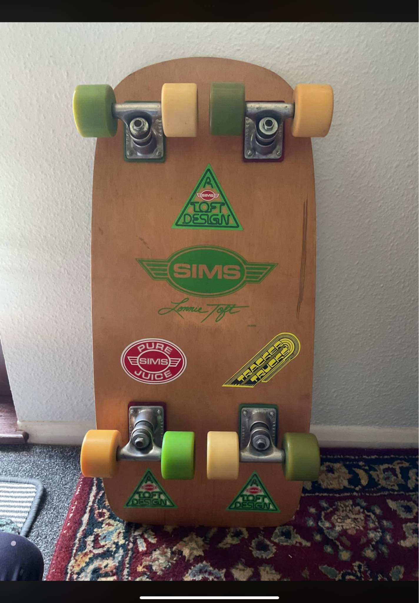 1970's Sims skateboard with tracker trucks on display