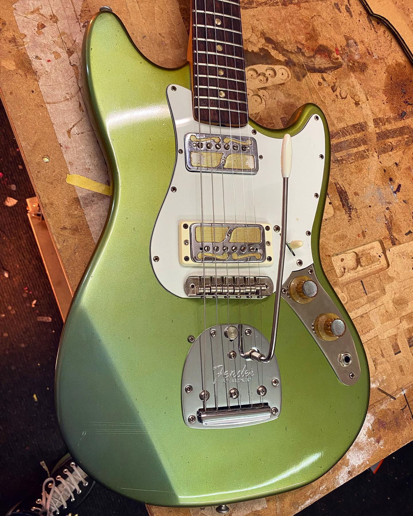 A 1966 Fender Musicmaster II. This red finish, 22-1/2 inch scale