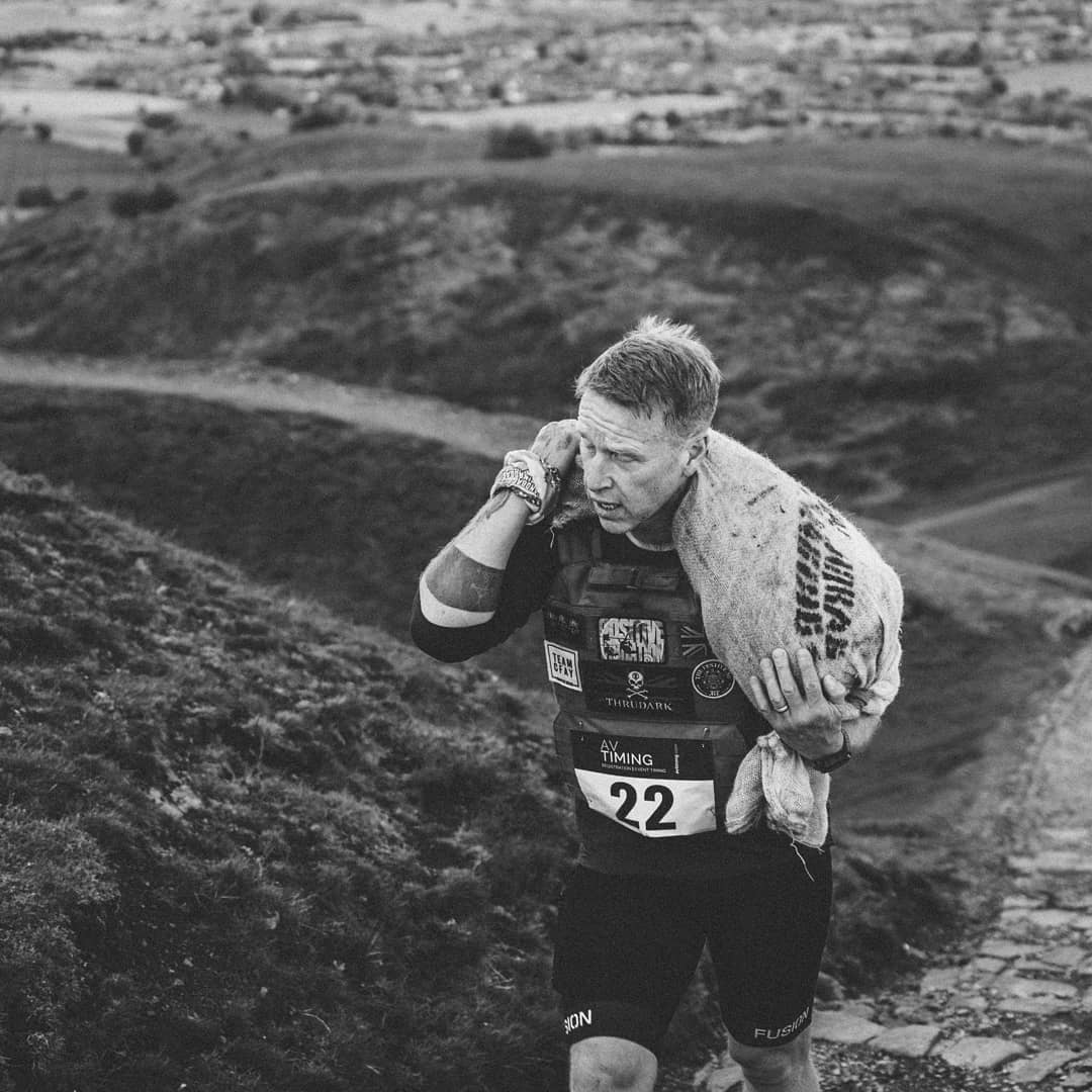 Sandbag Racing - 👉This is a 50 year old, carrying 50kg up... | Facebook