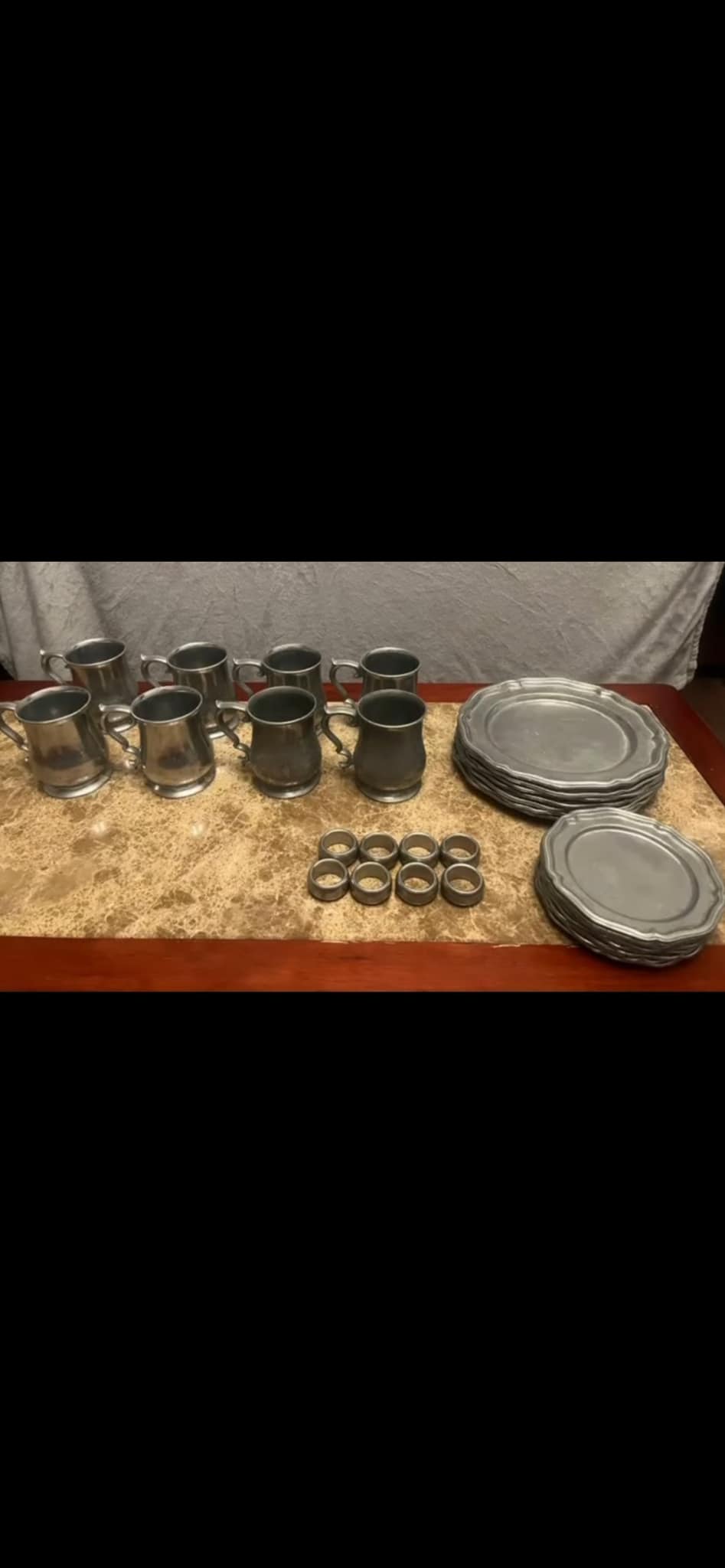 Are plates from Crown Castle Ltd real pewter or an aluminum zinc