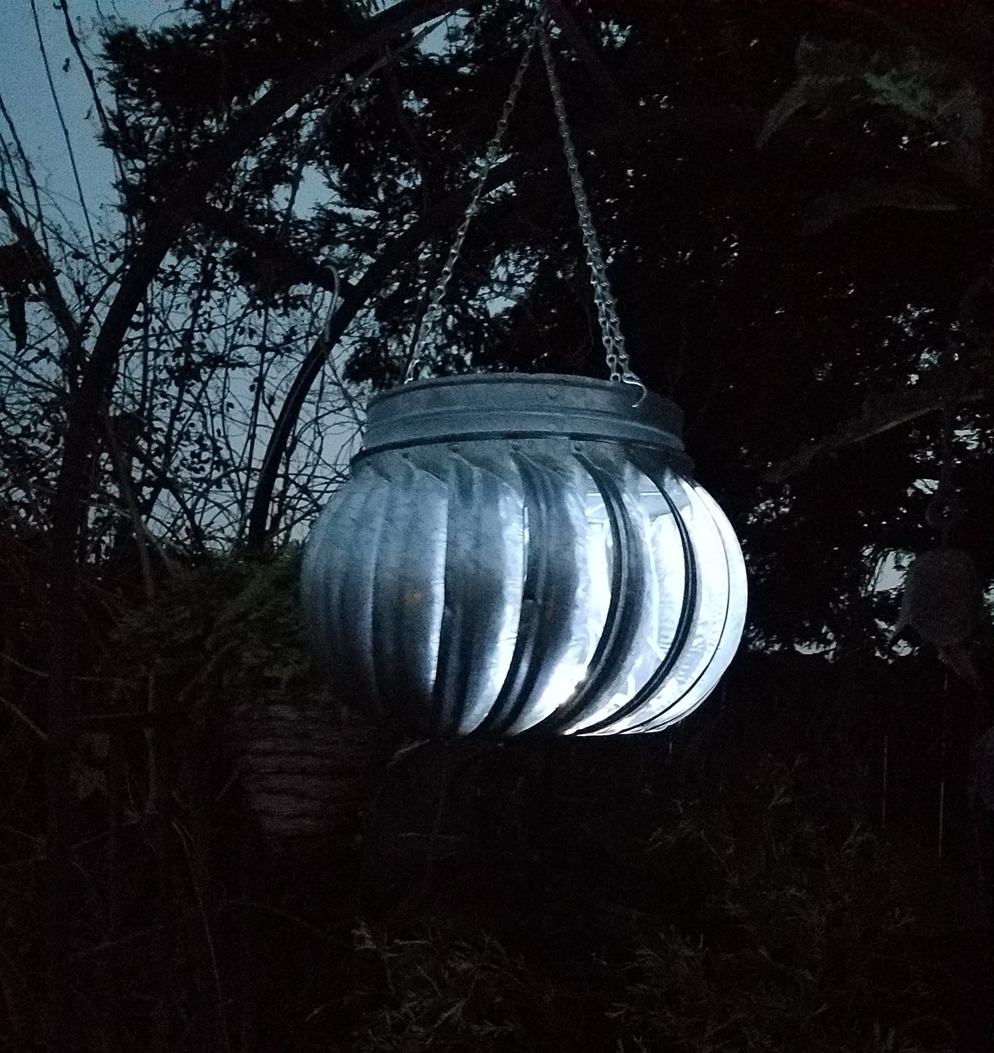 Old roof vent whirlwind with wooden hub rings