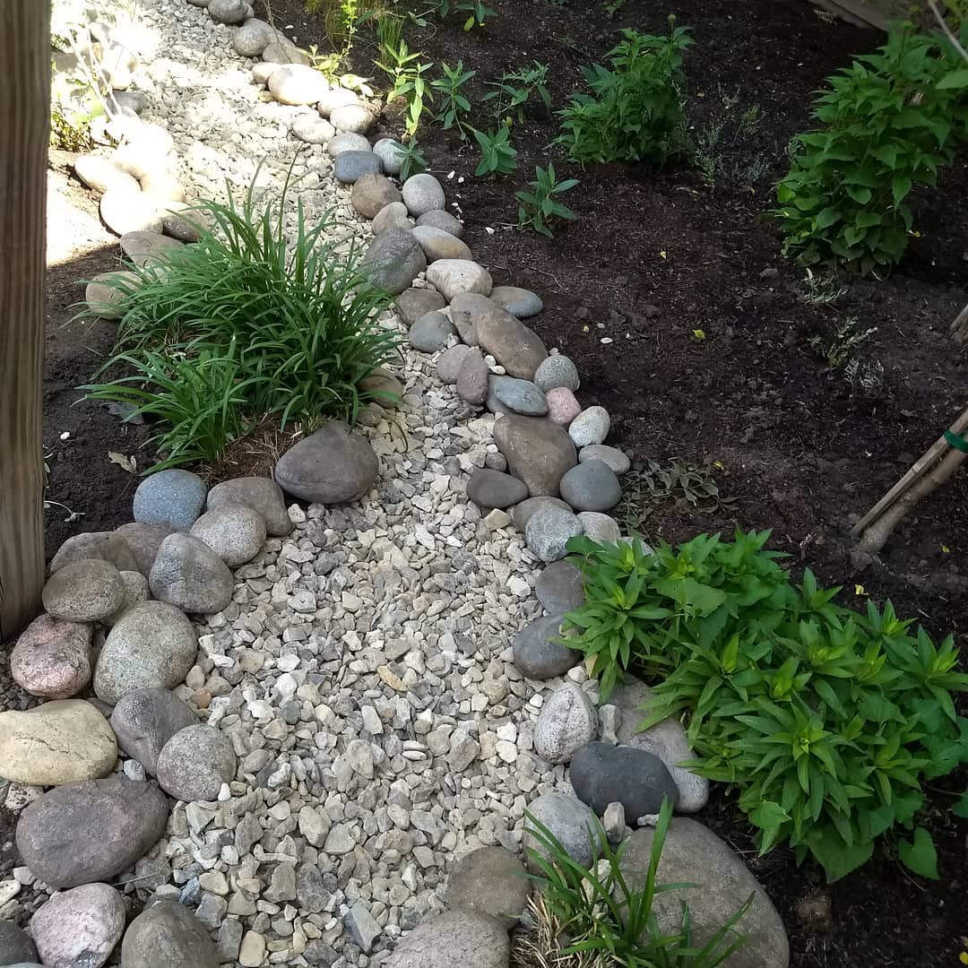 A dry streambed to take water from a... - Syntax Land Design