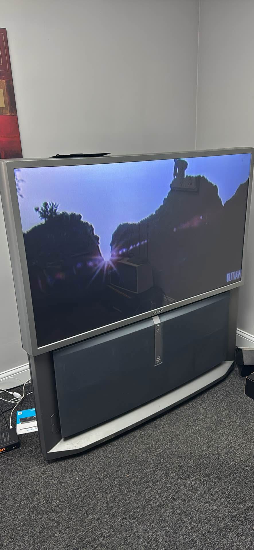 Sony Rear Projection TV works great, remote included. Will also include ...