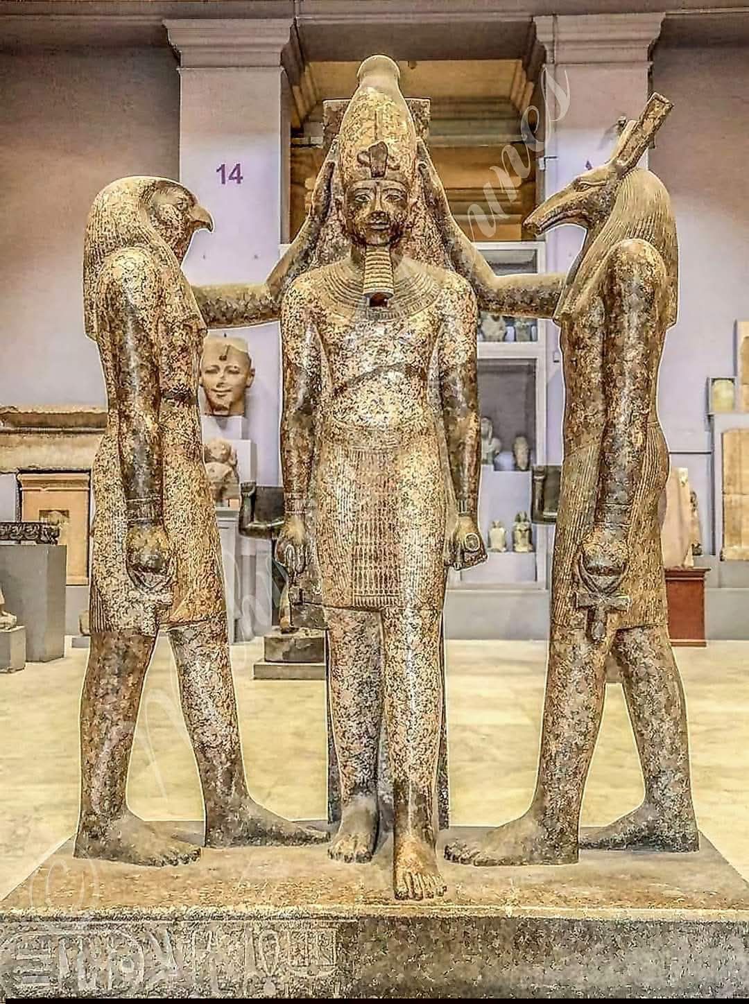 Ancient Egyptian triad statue of Ramses III with Horus and Seth