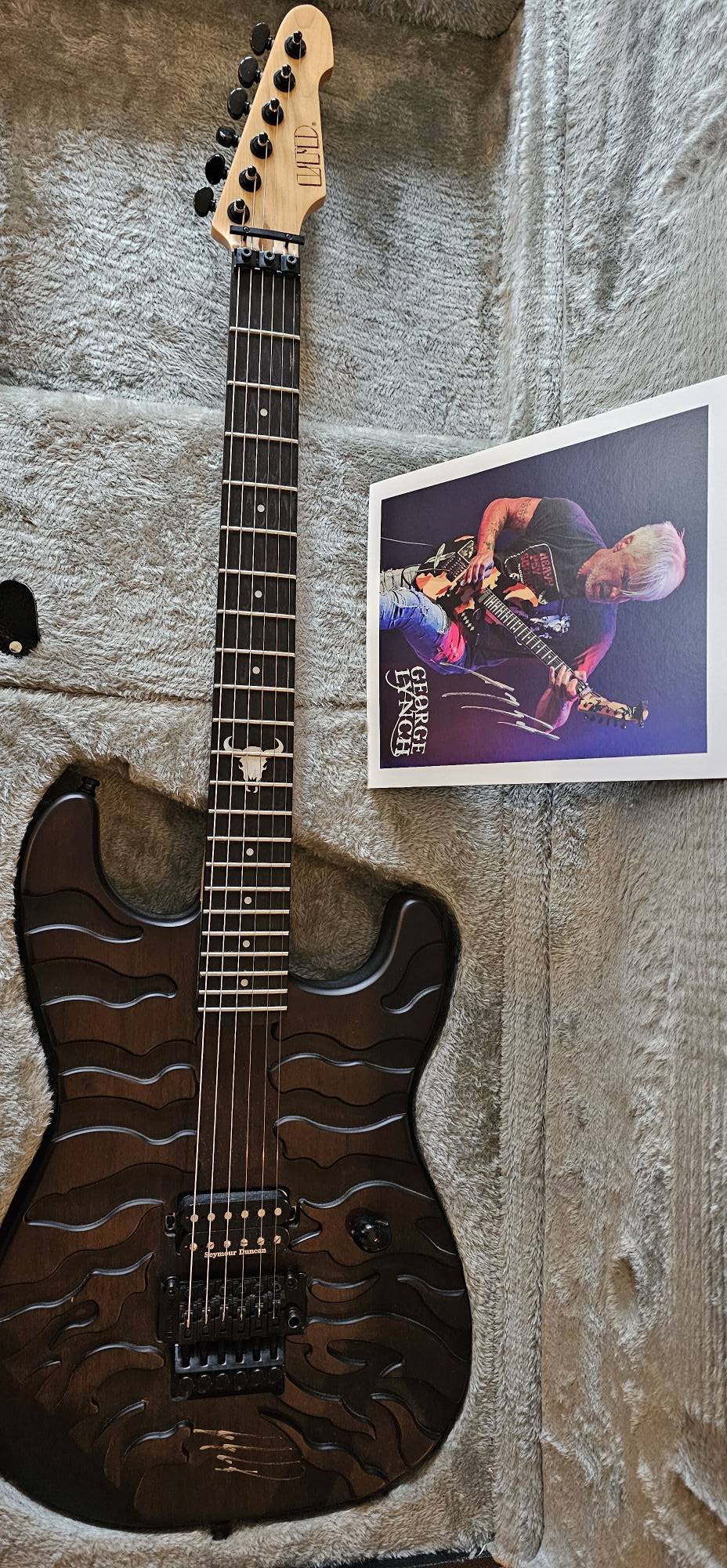 George Lynch signs LTD Burnt Tiger guitar