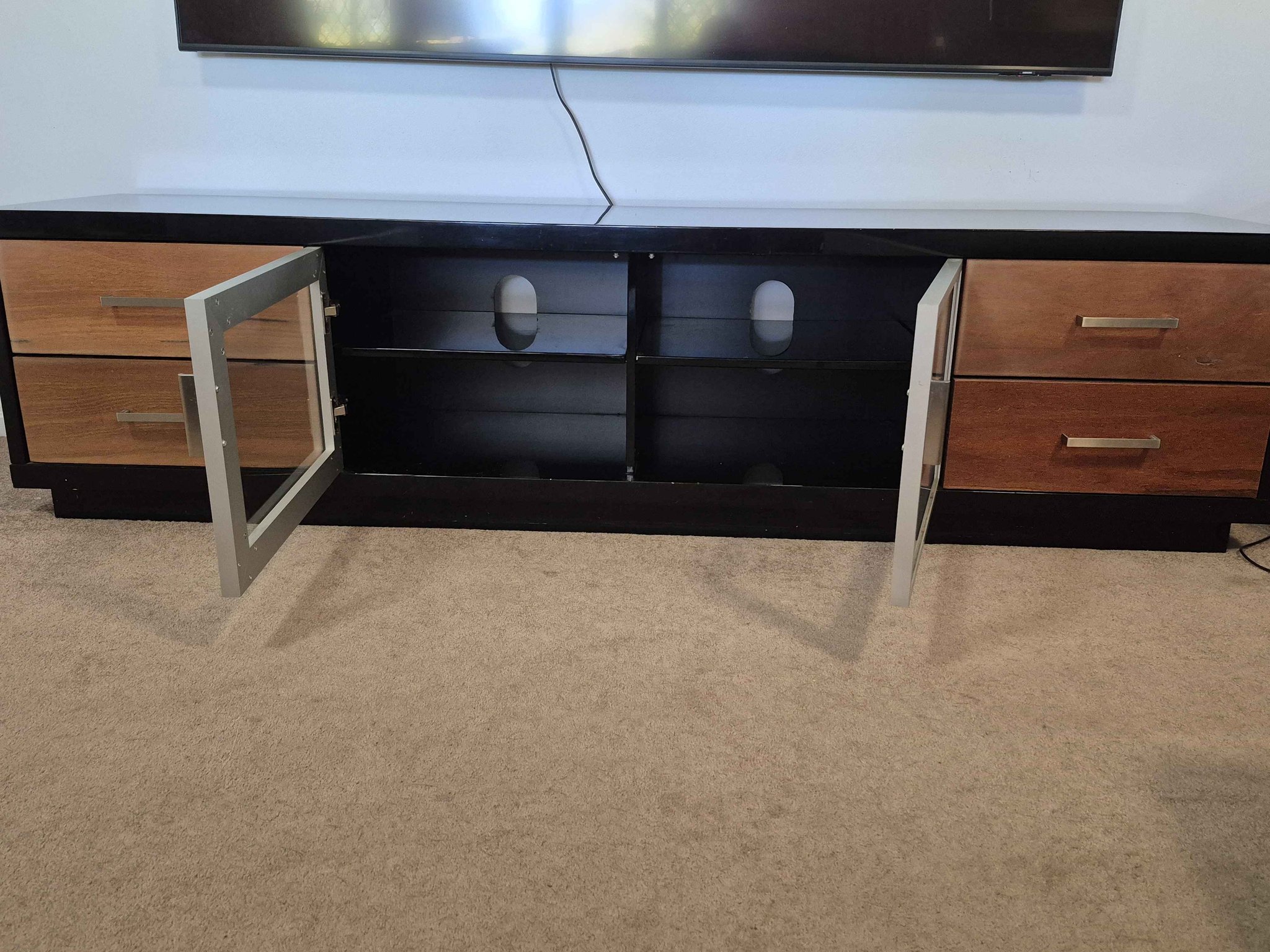 Marri and black lowline TV unit - Entertainment Units & TV Stands ...