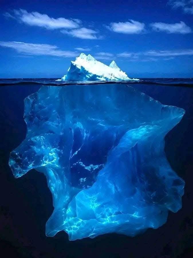 The photo shows a view of the iceberg under the sea. An iceberg is 