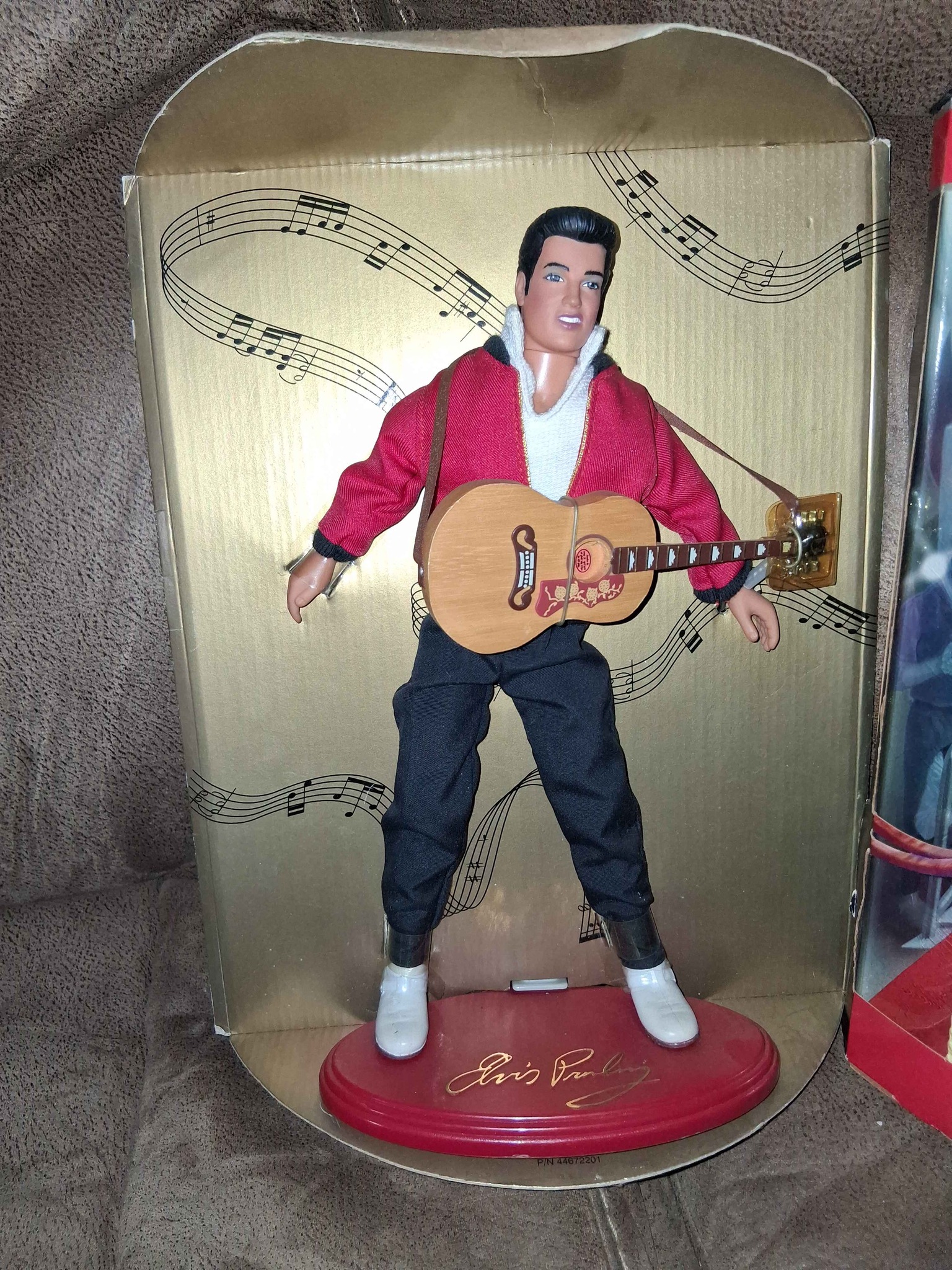 The 1984 Elvis Presley doll by World Doll is an officially