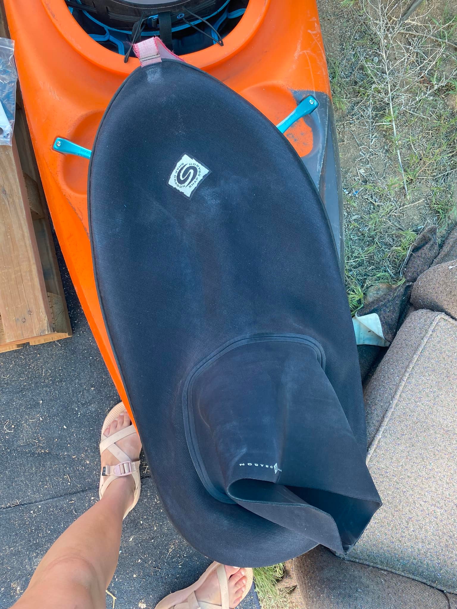 Durable Snap Dragon kayak spray skirt is size Large. It is made of