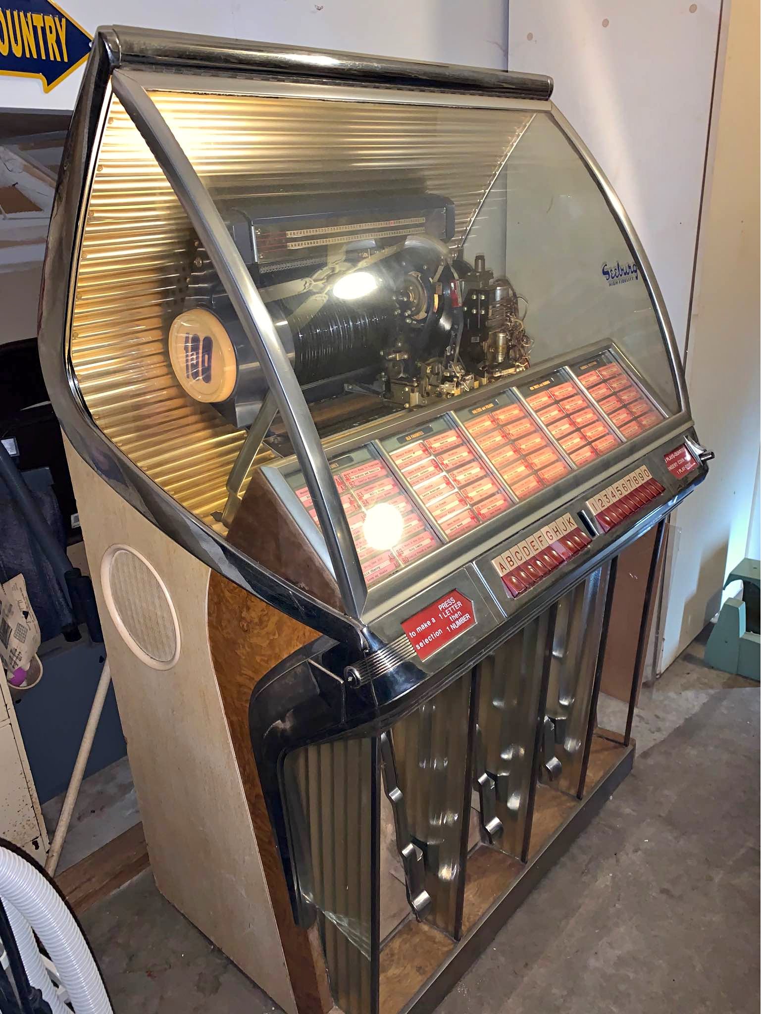 vintage-seeburg-jukebox-1954-seeburg-hf100r-classic-lights-up-man