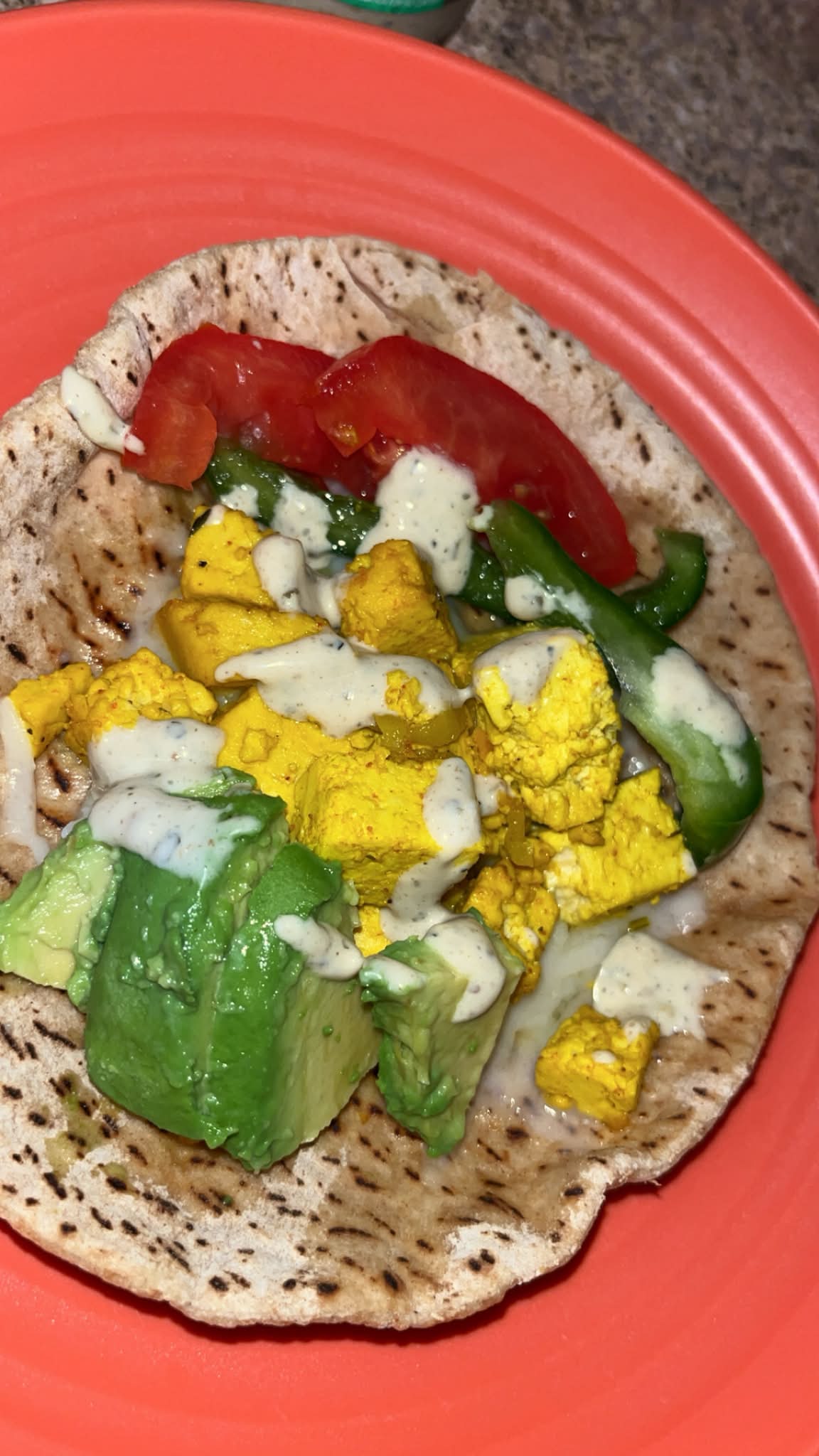 Tofu Subway-style pita with veggies and green goddess dressing