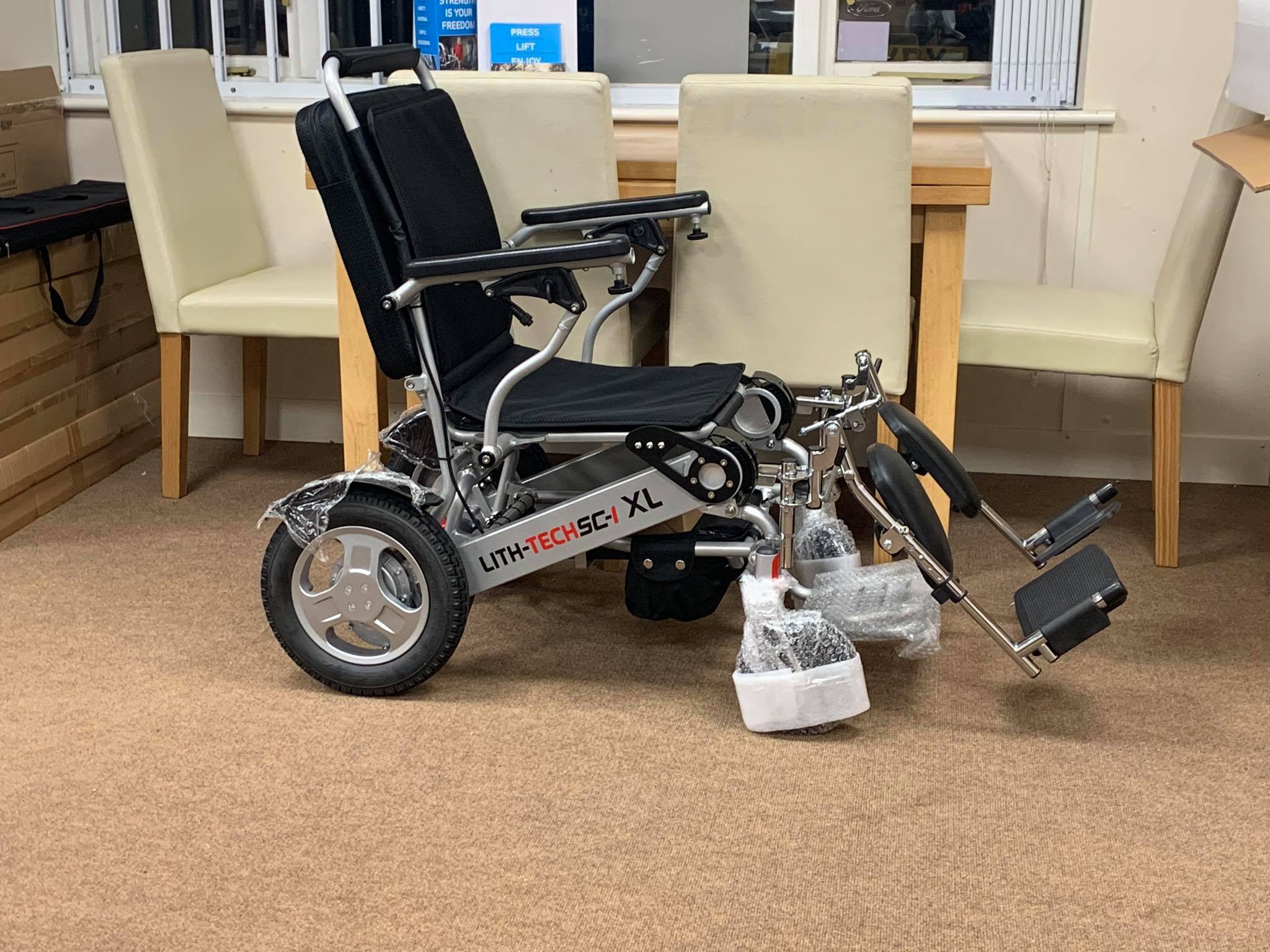 LITH-TECH SC-1 XL with leg rests just... - Lith-Tech Mobility | Facebook