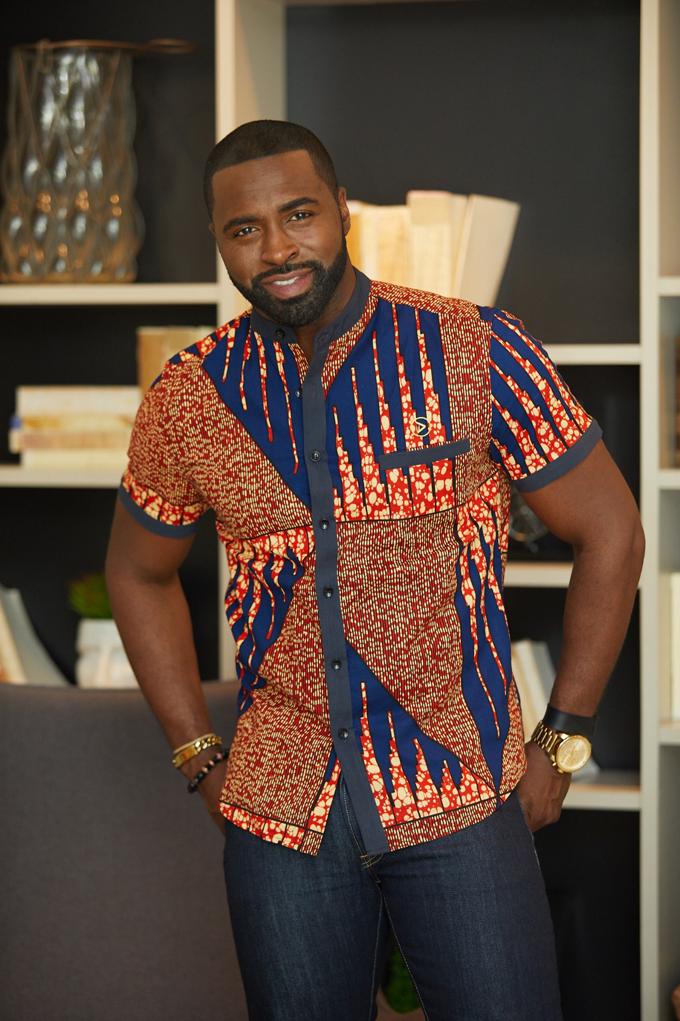 dress style knit shirts The Obi Shirt knows how to show up. Clean details, bold energy. Where would you wear this top? 👇🏾 Shop this now online at https://www.diyanu.com/products/obi-mens-african-print-knit-shirt-brick-mix-multipattern #diyanu #diyanustyle SS26 EOS Sale Womens