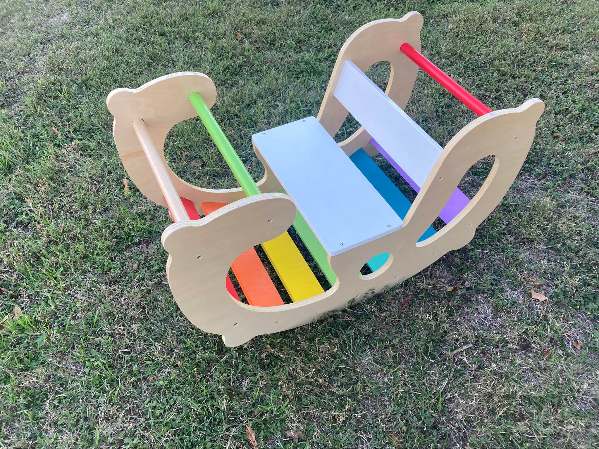 Wooden climbing structure/rocker and Little Tikes trampoline for young ...