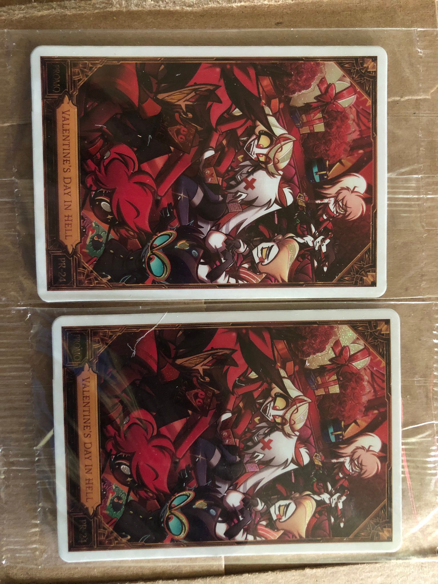 Hazbin Hotel Valentine's Day trading cards with scratches